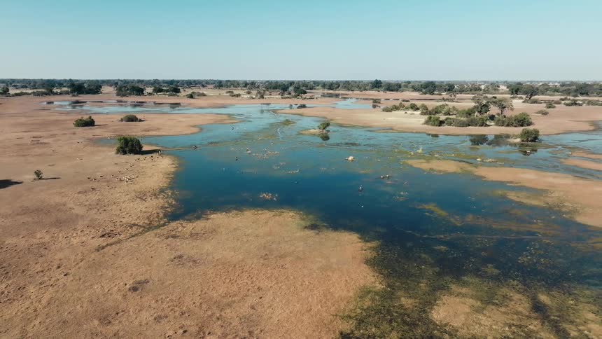 Small ponds of water are on the landscape