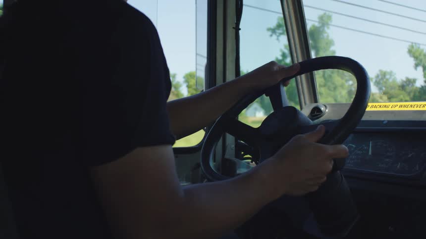 A man is driving a truck