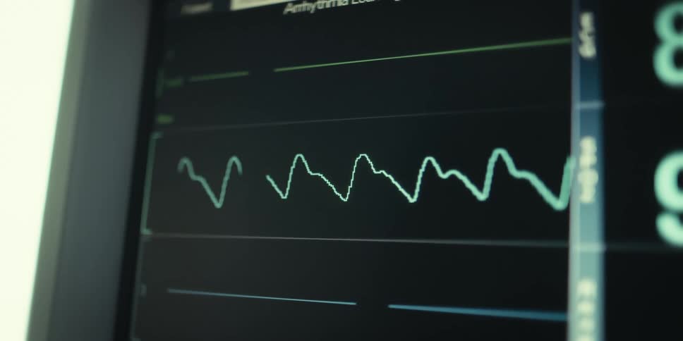 The heart monitor has waving lines