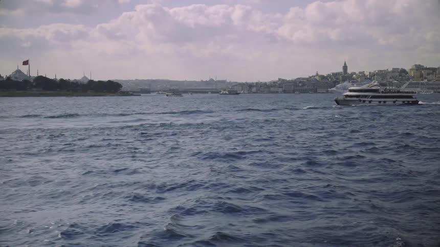 Boat floating in a large area of water