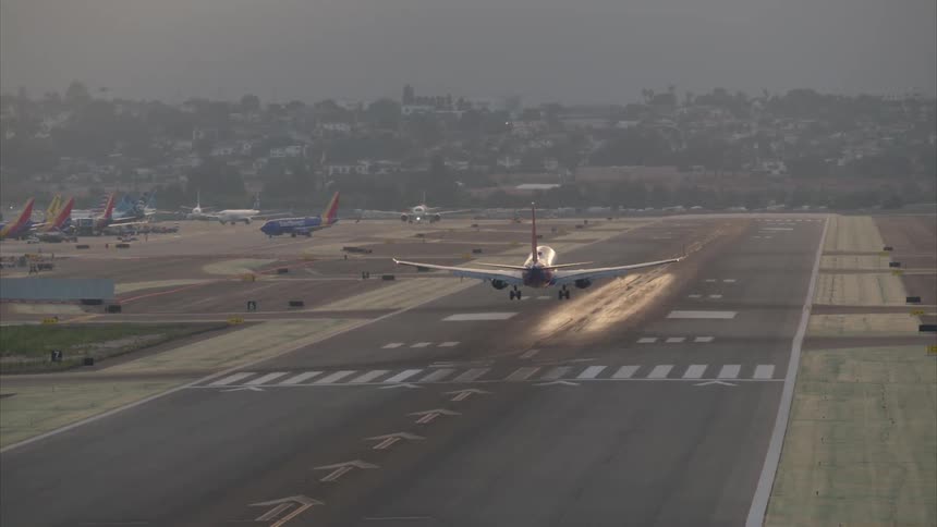 Plane landing on an airport runway