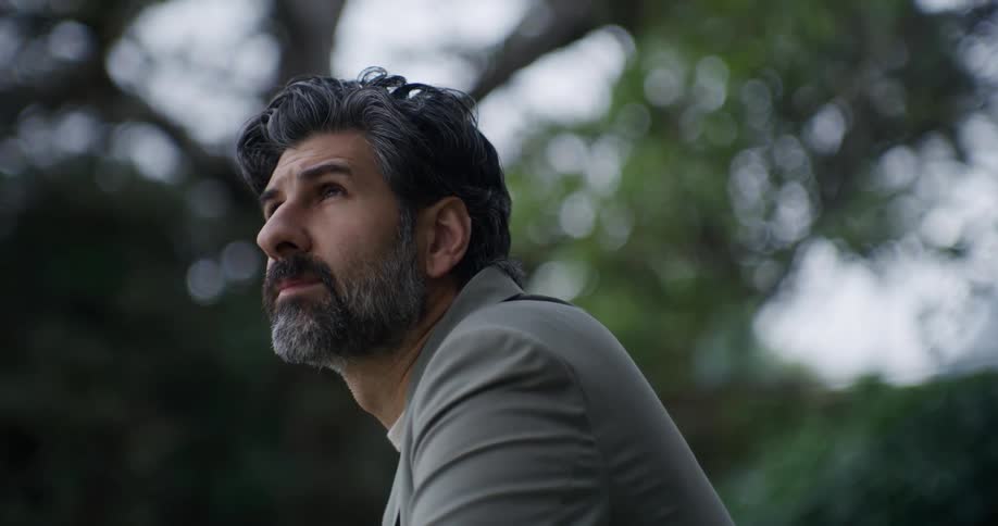 Portrait of a man with a drool observing the view