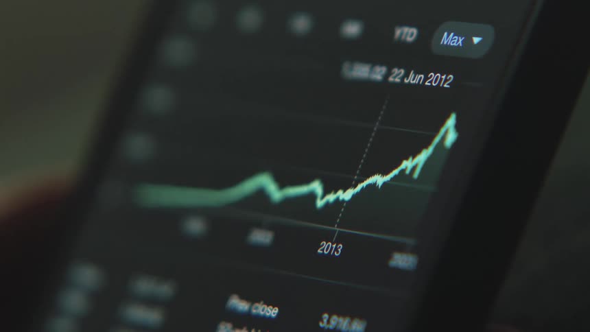 Stock results are shown on a phone screen