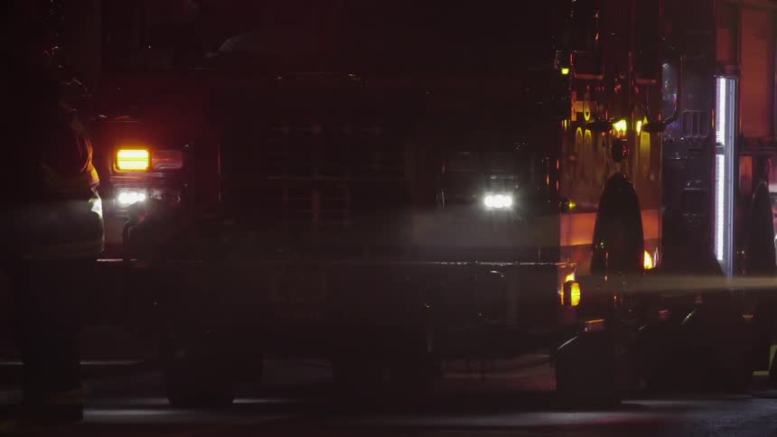 Fire truck with flashing lights and smoke