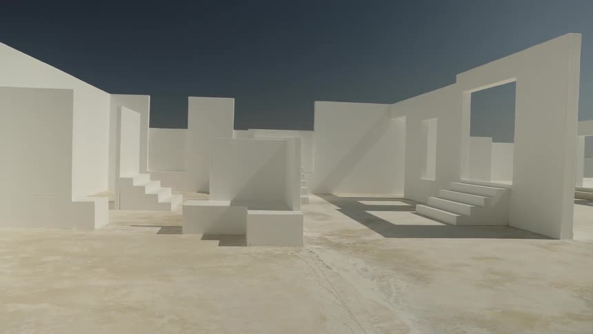 A minimalist geometric white concrete architectural structure under a deep blue sky