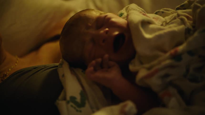 Portrait of a crying newborn baby