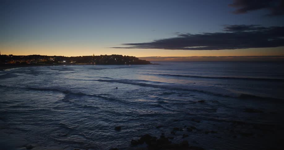 Coastal landscape at dawn with the sky in deep blue tones and warm colors on the horizon