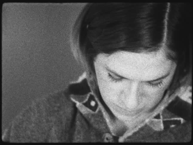 Portrait of a woman looking down