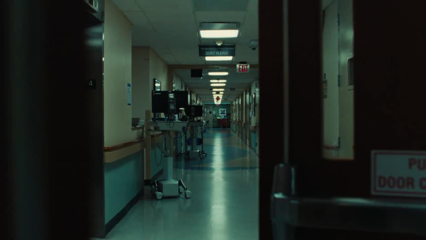Door closing in a hospital corridor