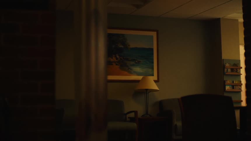 Interior design of a living room with chairs and an art painting on the wall