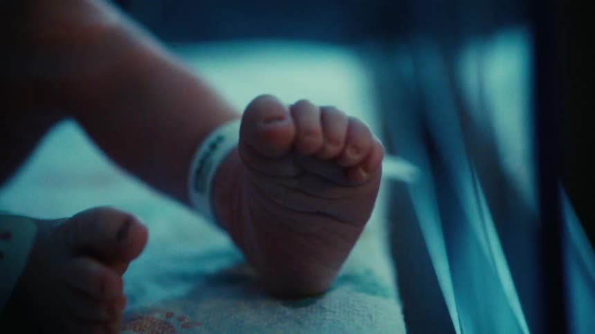 Closeup of a babys foot with identification in a hospital