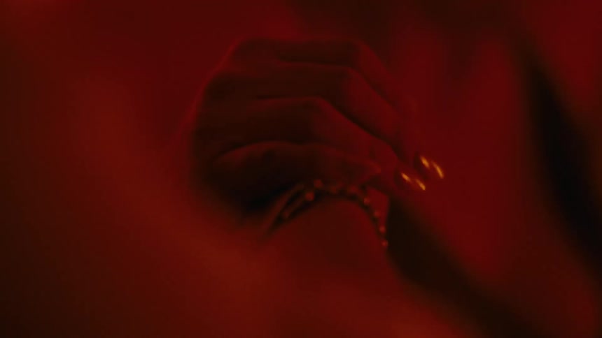 Close up of two people with their hands together