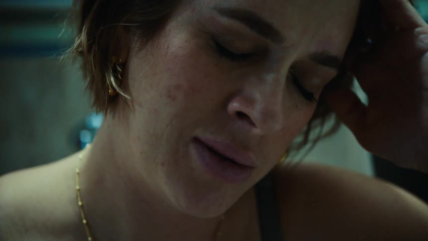 Portrait of a woman with sad eyes closed