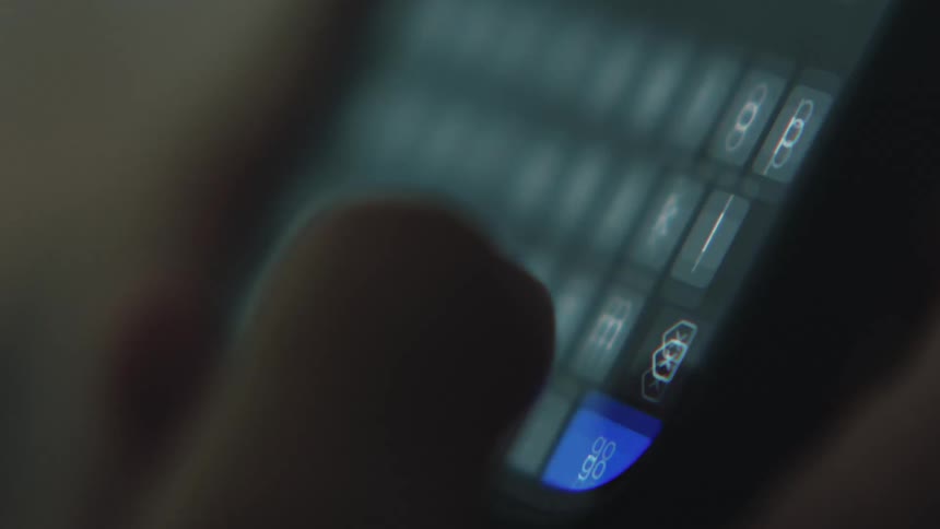 A person conducts a search on their cellphone