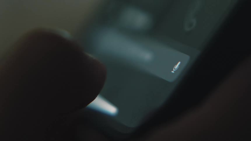 Person makes selections on device touchscreen with a thumb