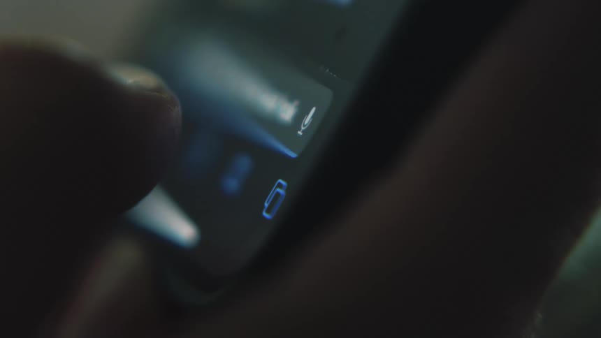 Lights move on an electronic device as a persons thumb is seen pressing buttons as they appear