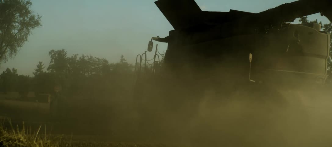 Agricultural machinery running through a field