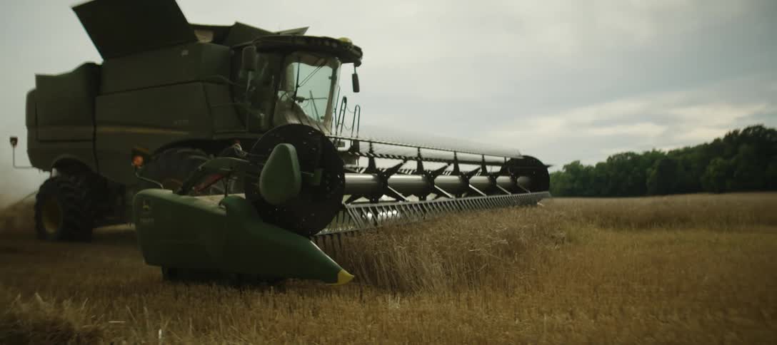 Combine harvester operating in a wheat field