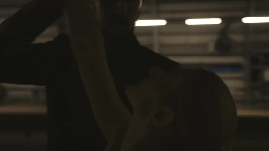 A graceful couple dancing the tango at a subway station