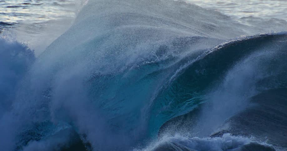 Ocean wave forming and breaking with force