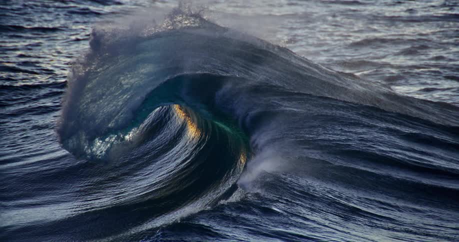 Ocean wave breaking and forming foam