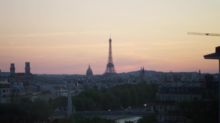 The eiffel tower dominates the skyline of paris