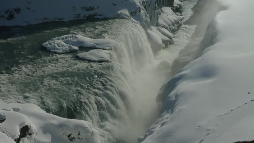 A waterfall feeds the stream