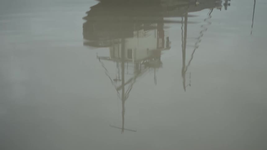 Reflection of a ship on the water surface