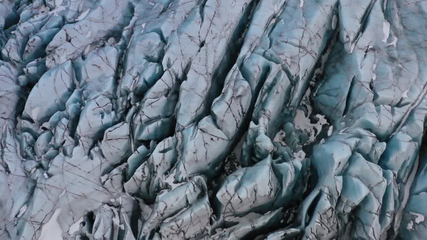 The ice is covered with crevices