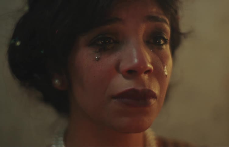 Close up of the face of a sad woman crying