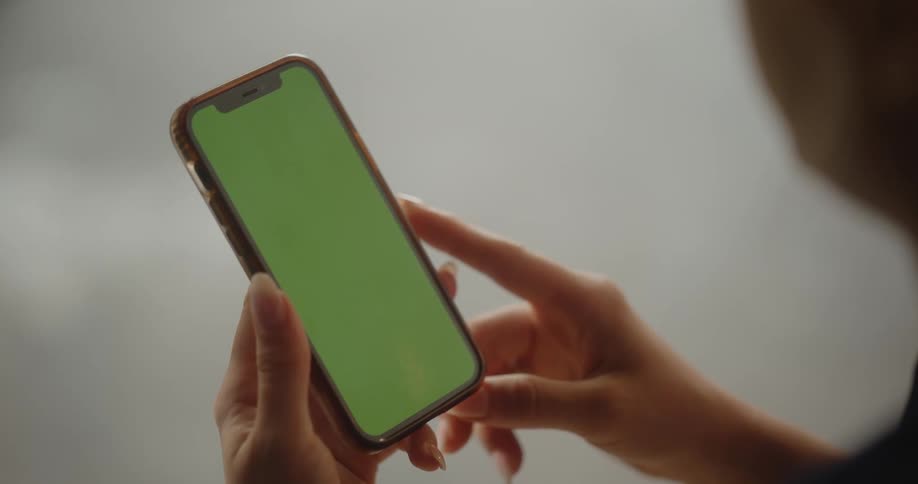 Person holds a smartphone