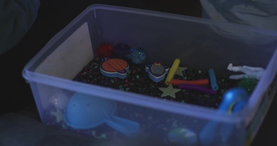 People pick through items in a container