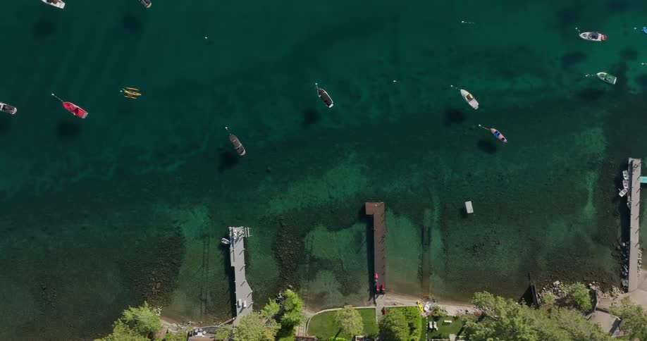 Man boats are docked near docks