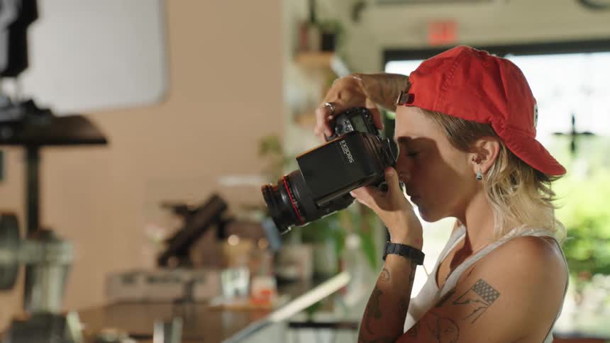A woman is taking photographs