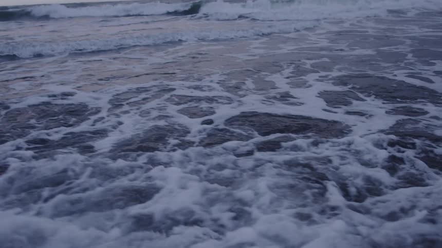 Waves crash on the beach