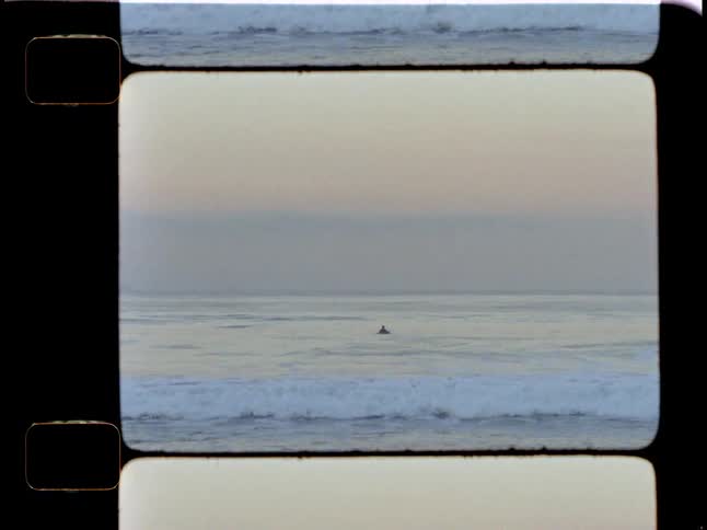Person isolated in the sea in the morning