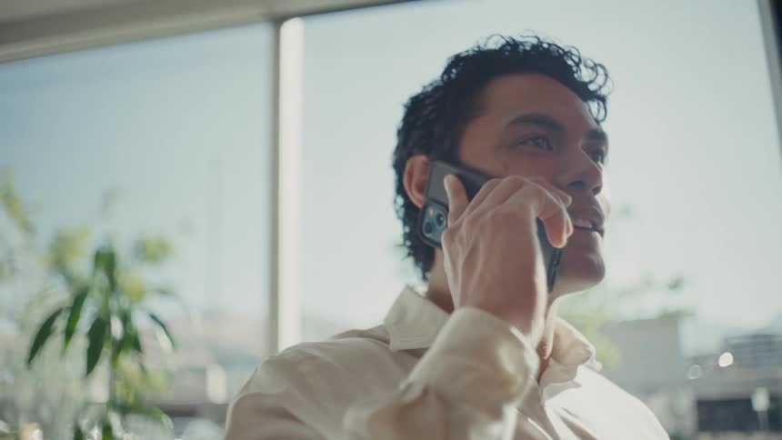 Man answering a phone call on his smartphone