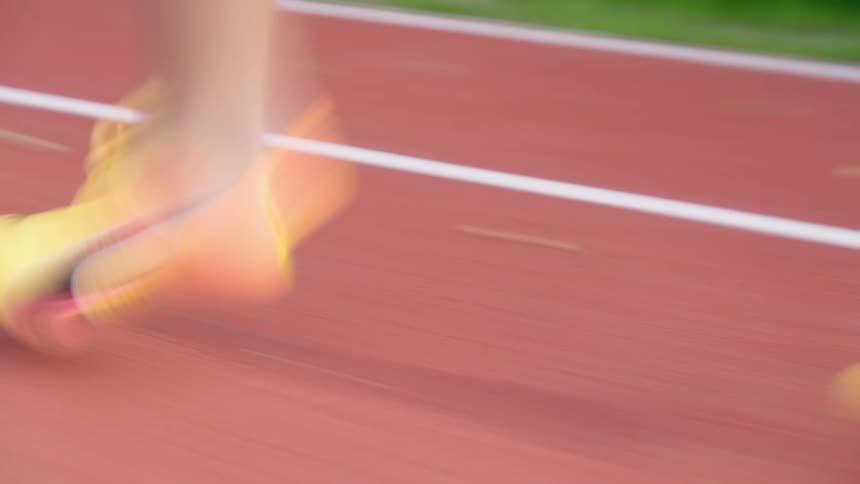 A person is running on the track