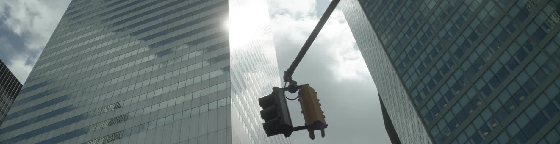 A shot of two high rise buildings from ground level