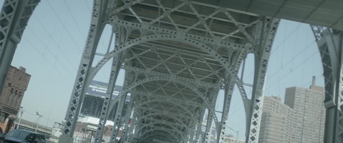 The underside of a bridge in a city