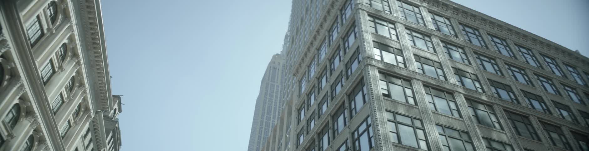 The sun is reflecting off the windows of this building