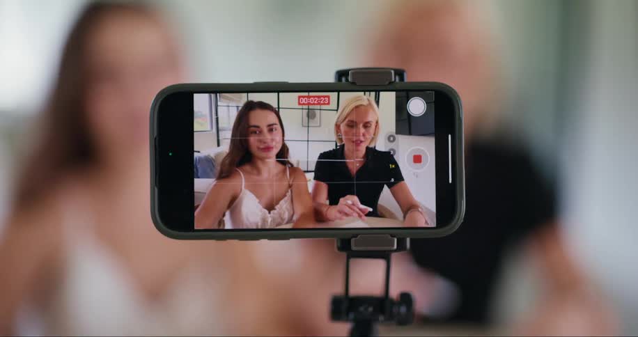 Iphone screen recording two women sitting and talking
