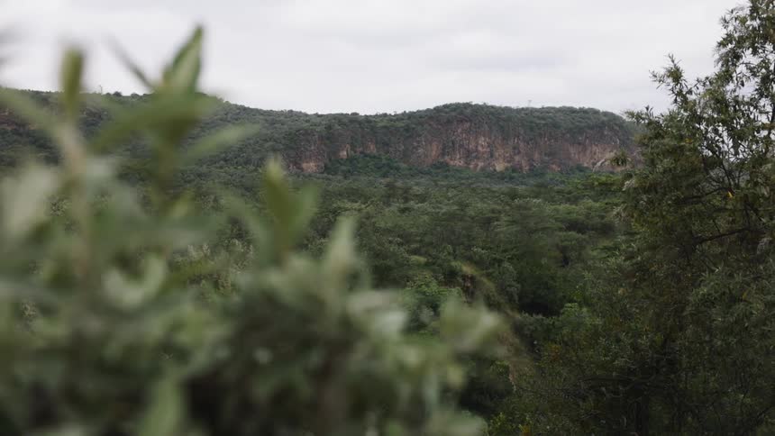 Landscape of green mountains on a cloudy day