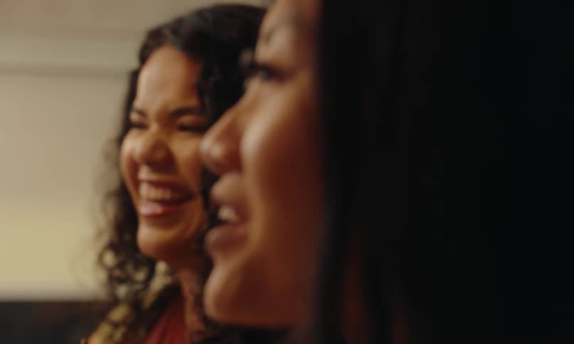 Portrait of two friends talking happily