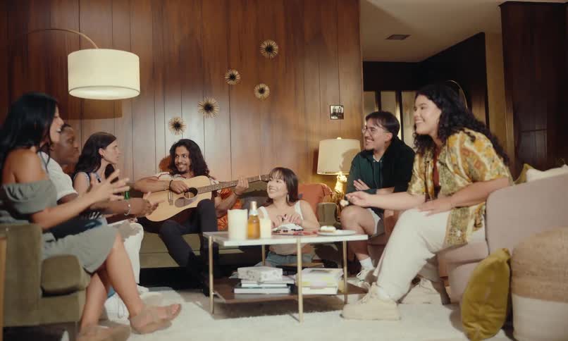 Friends talk at a party