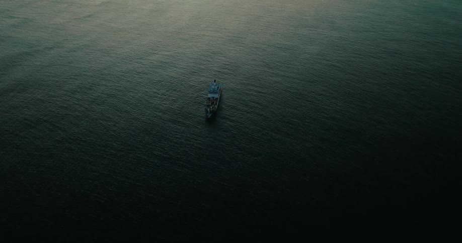 Aerial view of a ship isolated by the sea