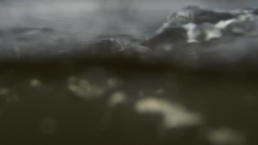 Extreme close up on a flowing river