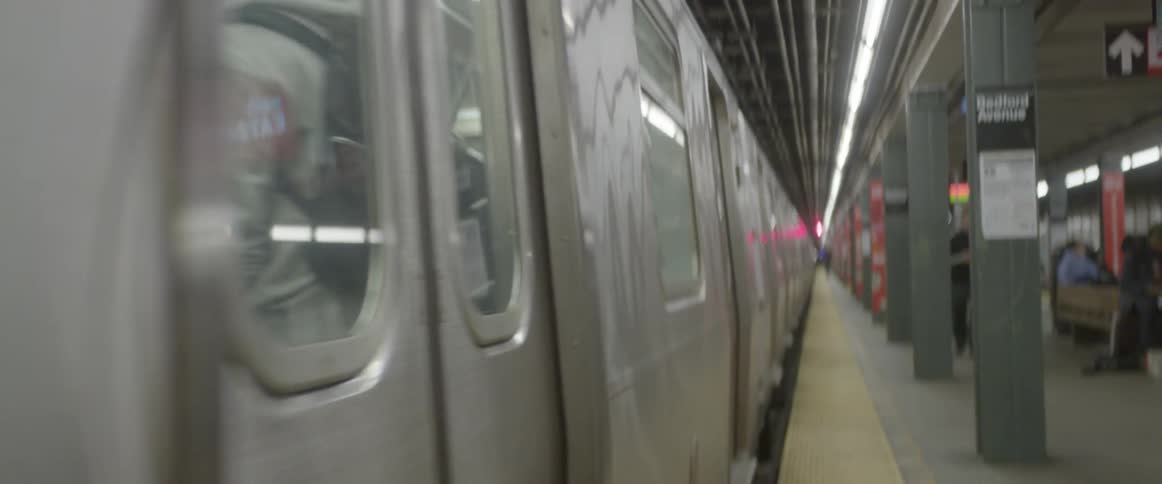 A subway leaving the station