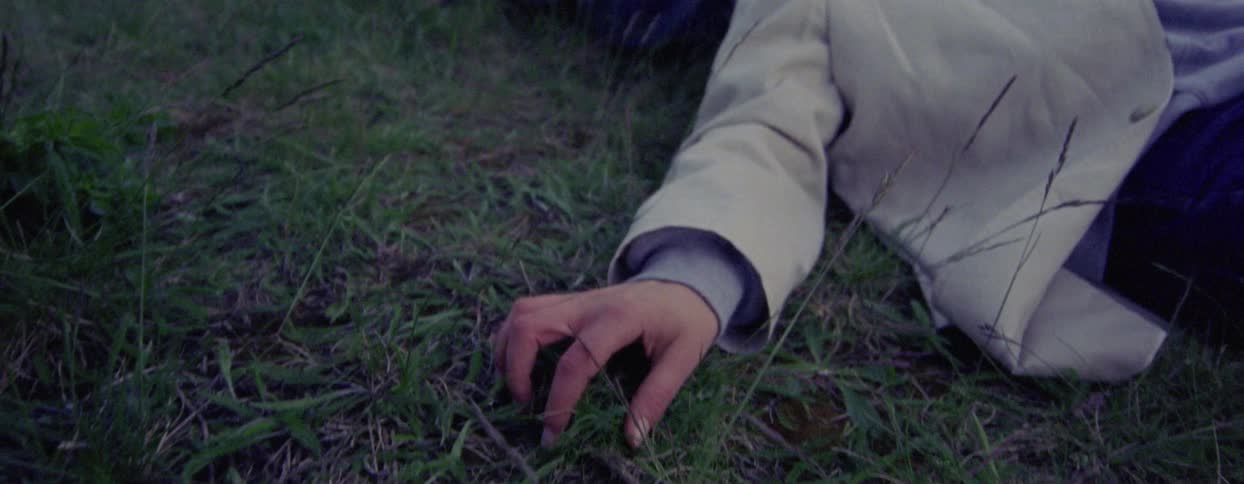 Woman lying on the grass
