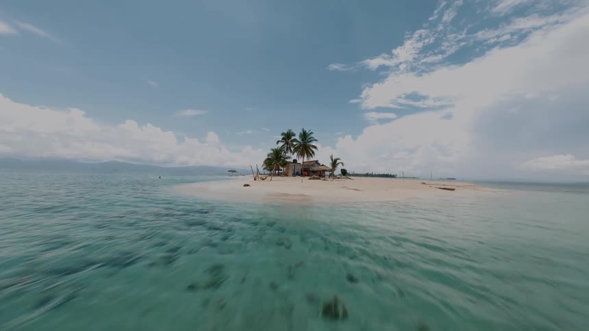 Paradise Island with Two Girls Relaxing in Hammocks and a Secluded Hut Surrounded by Palm Trees and Shallow Waters